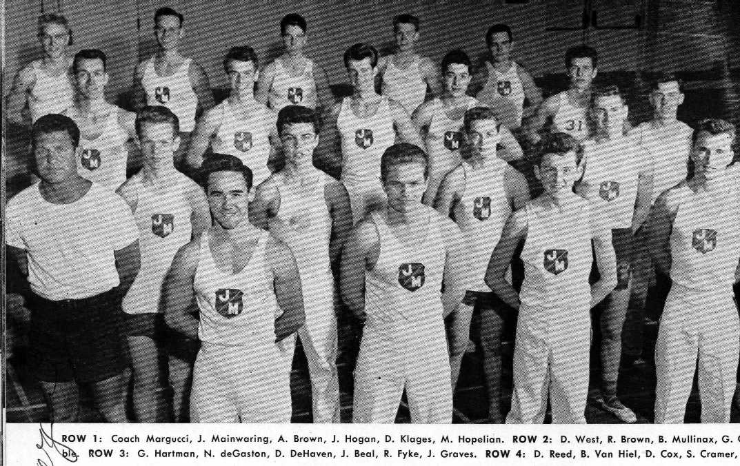 1955  HS Neal Sr year with gymnastics team.